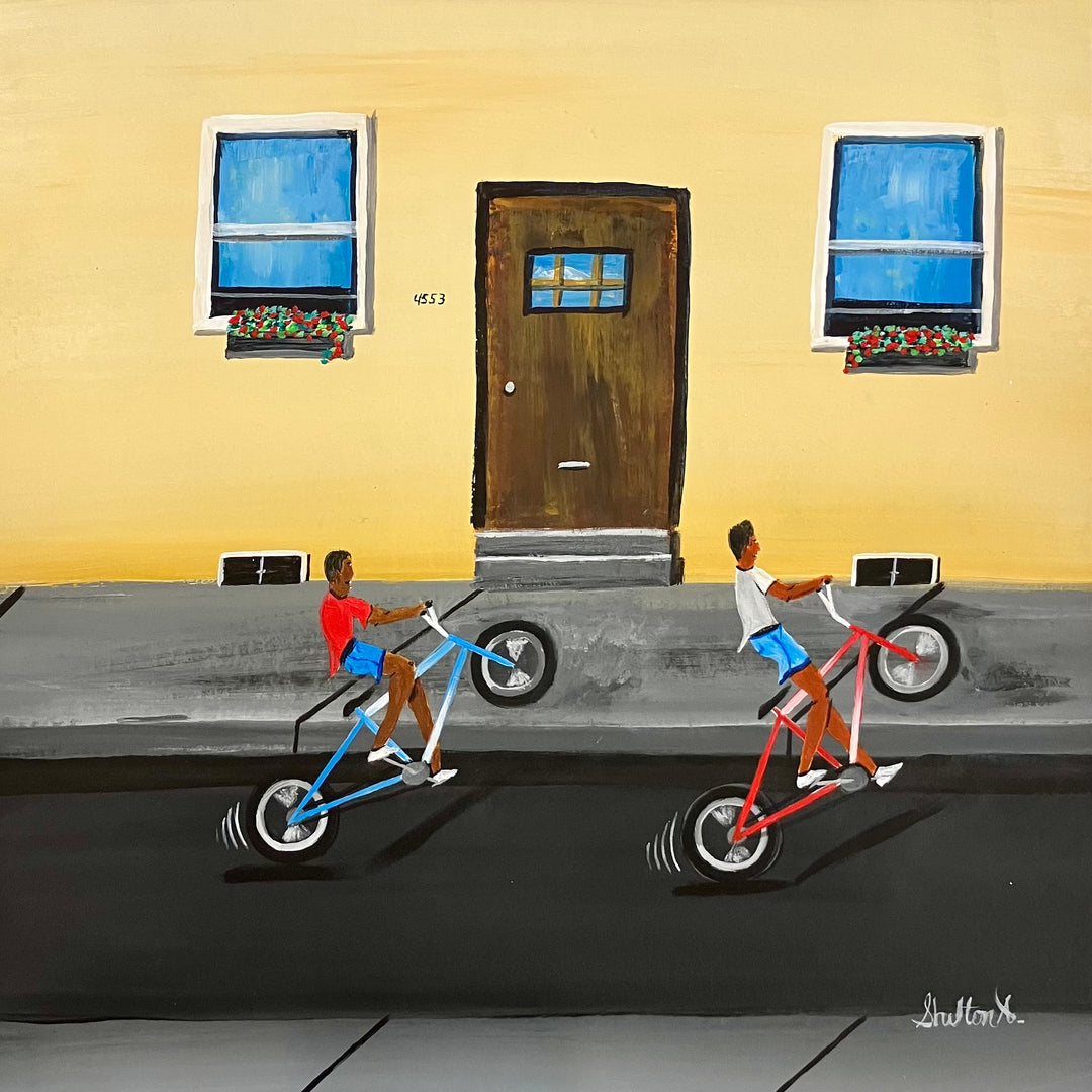 two boys hitting wheelies on back wheel bicycle bike outside house with door and windows