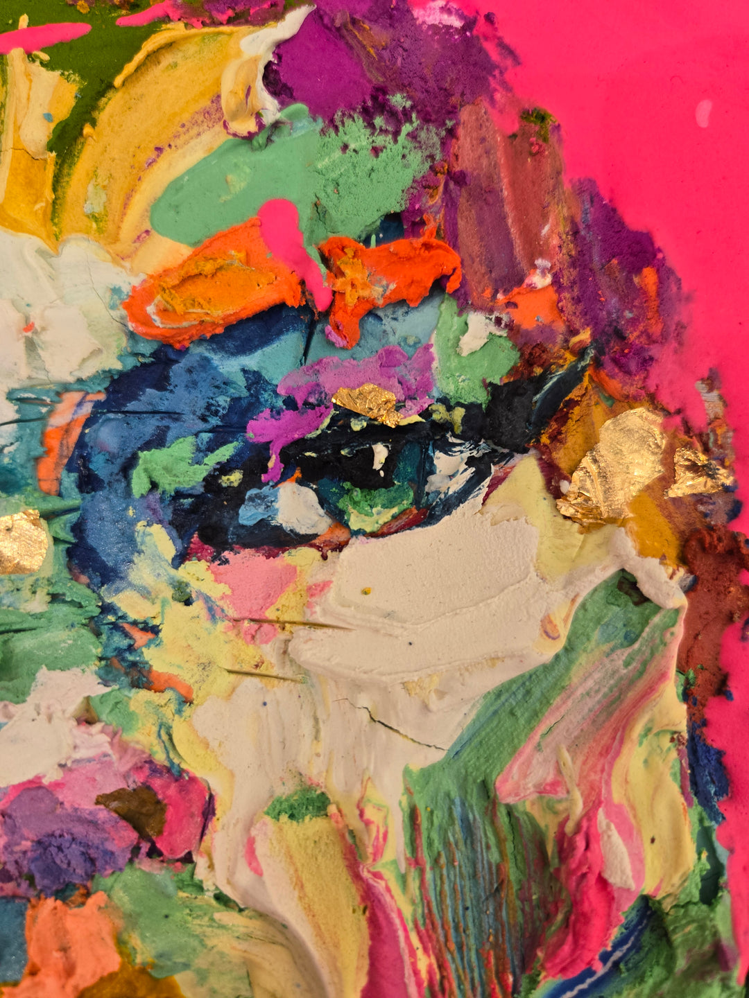 front facing portrait of woman with pink splattered paint hair and skin made of green red blue yellow purple and pink in impasto thick acrylic with details of gold foil and gestural marks of color at bottom of canvas on white background