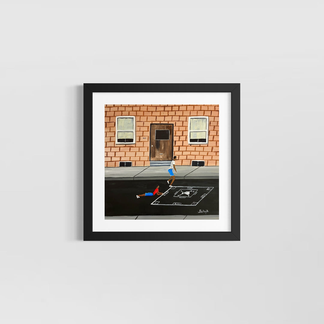 two boys playing blacktop game outside of brick building 
