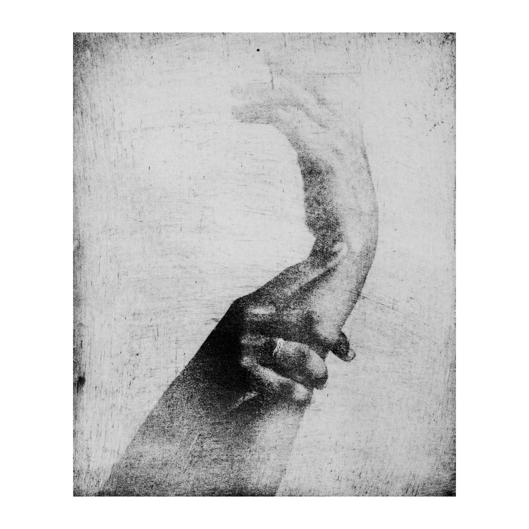 hands wrists blurry transparent reaching grabbing fingers black and white