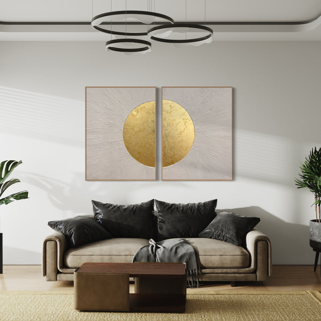Beaming Duo by Lee in Cerulean. Textured diptych with white acrylic joint compound, lines emanating from center and beaming outwards with shiny gold circle in the middle