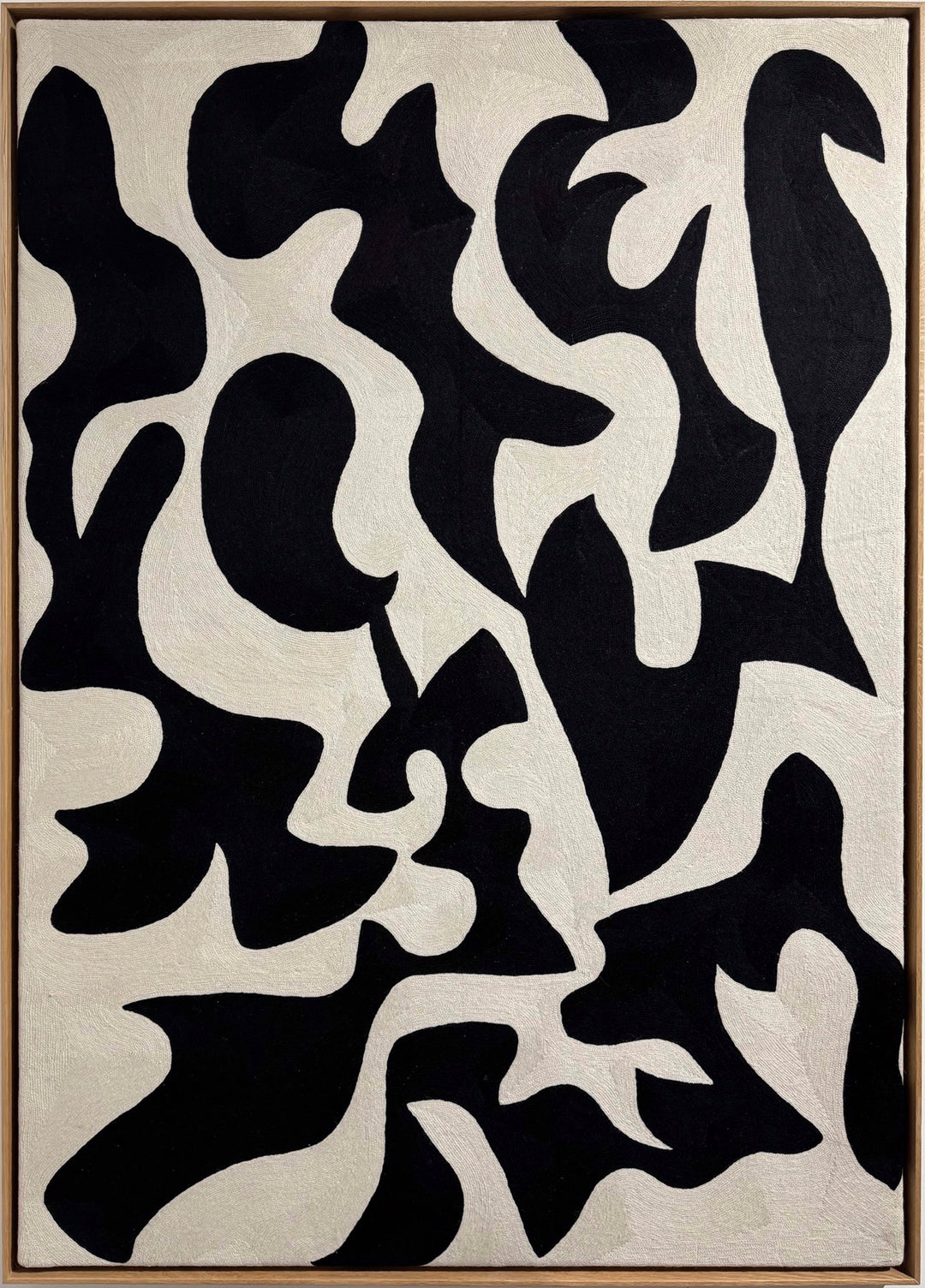 chain stitched textile embroidery abstract black and white negative space pattern shapes in wood frame