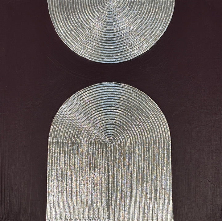 Lee in Cerulean, Eminence Duo II, joint compound, liquid leaf and acrylic, 14 x 14 inches. A silver half circle at the top edge above a silver arch, both formed from concentric raised lines, on a dark plum background.