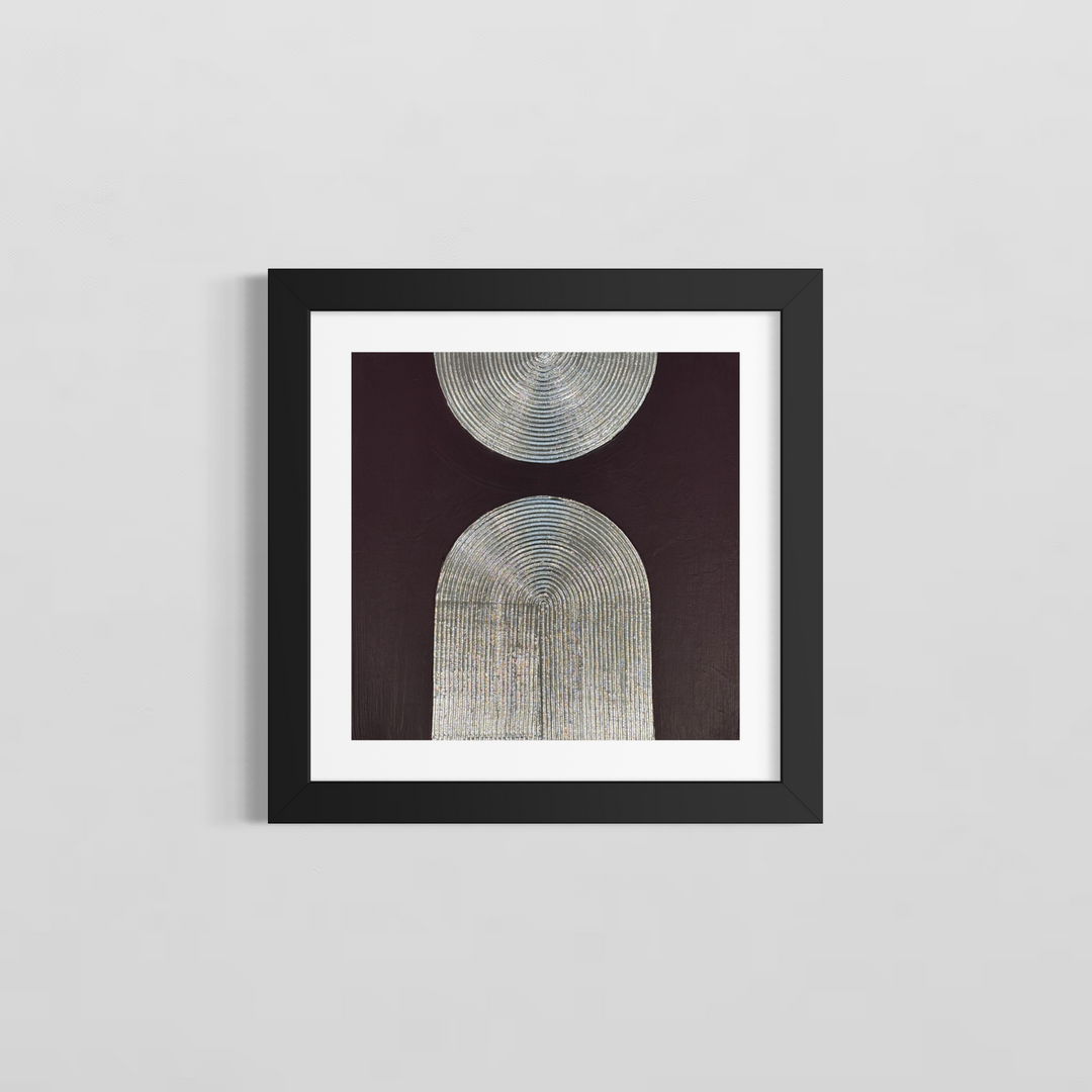 Lee in Cerulean, Eminence Duo II, joint compound, liquid leaf and acrylic, 14 x 14 inches, shown in a black frame with a white mat on a light grey wall. A silver half circle at the top edge above a silver arch, both formed from concentric raised lines, on a dark plum background.