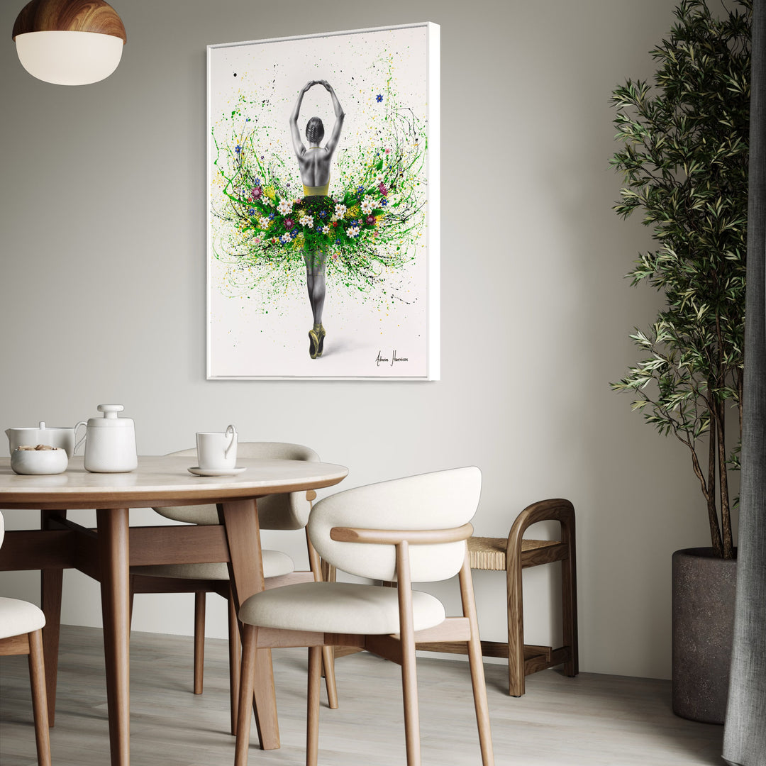black and white ballerina dancer with arms up and green paint splatter tutu with flowers in blue pink and white on white background