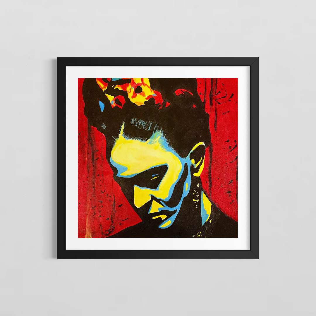 "Frida" by US-based artist Suave Gonzalez, an expressive acrylic on canvas portrait of iconic Mexican artist Frida Kahlo, depicted with her signature floral crown rendered in vivid yellow and red, her face illuminated in bold strokes of yellow and blue against a deep black silhouette and a rich red background. Dynamic paint splatters add raw energy to this powerful tribute to one of art history&