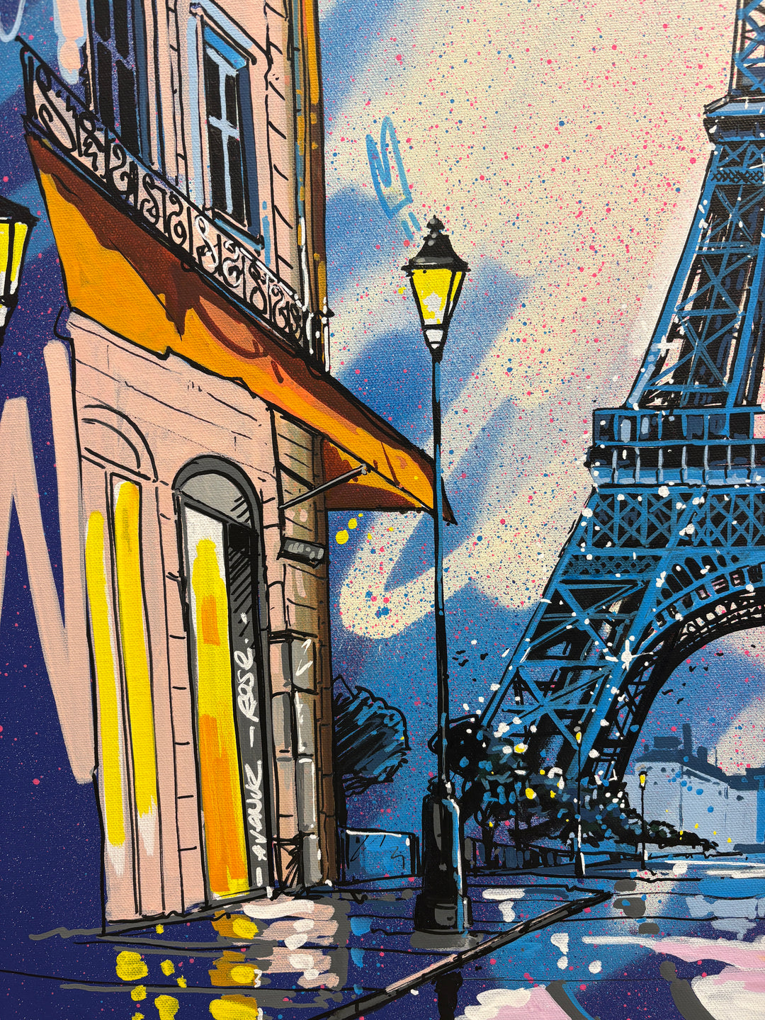 "From Paris with Love" by Pappay — a vibrant street art-inspired painting on canvas depicting the Eiffel Tower framed by a Parisian boulevard with glowing cafés and street lamps, surrounded by explosive blue, pink, and white graffiti lettering reading "Paris" and "Love" against a deep cobalt sky. A bold, romantic celebration of Paris. Original contemporary Paris Eiffel Tower street art pop art painting on canvas available at Morton Contemporary gallery.