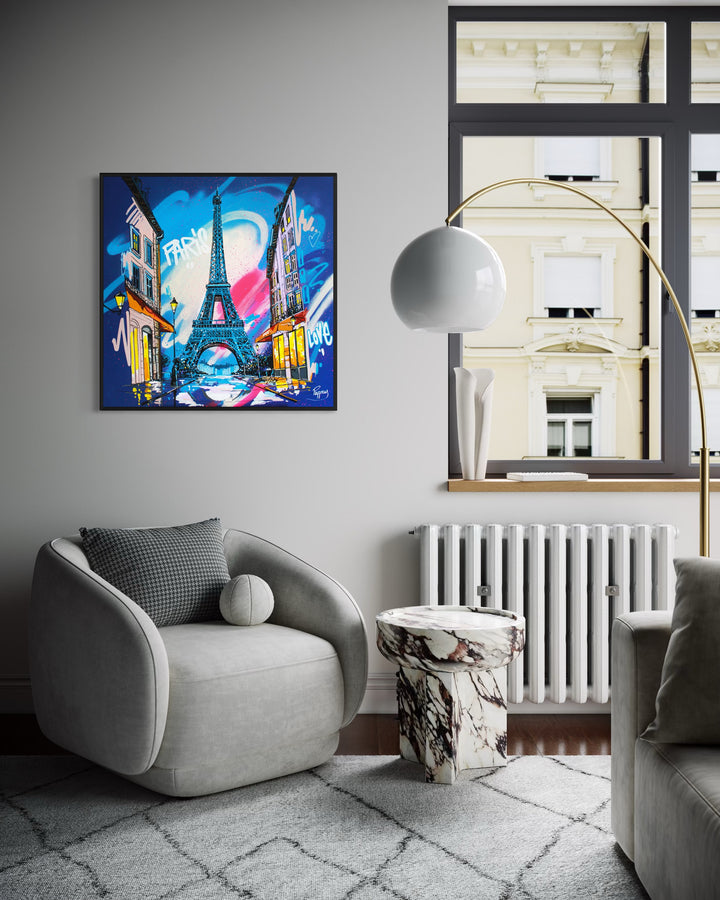 "From Paris with Love" by Pappay — a vibrant street art-inspired painting on canvas depicting the Eiffel Tower framed by a Parisian boulevard with glowing cafés and street lamps, surrounded by explosive blue, pink, and white graffiti lettering reading "Paris" and "Love" against a deep cobalt sky. A bold, romantic celebration of Paris. Original contemporary Paris Eiffel Tower street art pop art painting on canvas available at Morton Contemporary gallery.