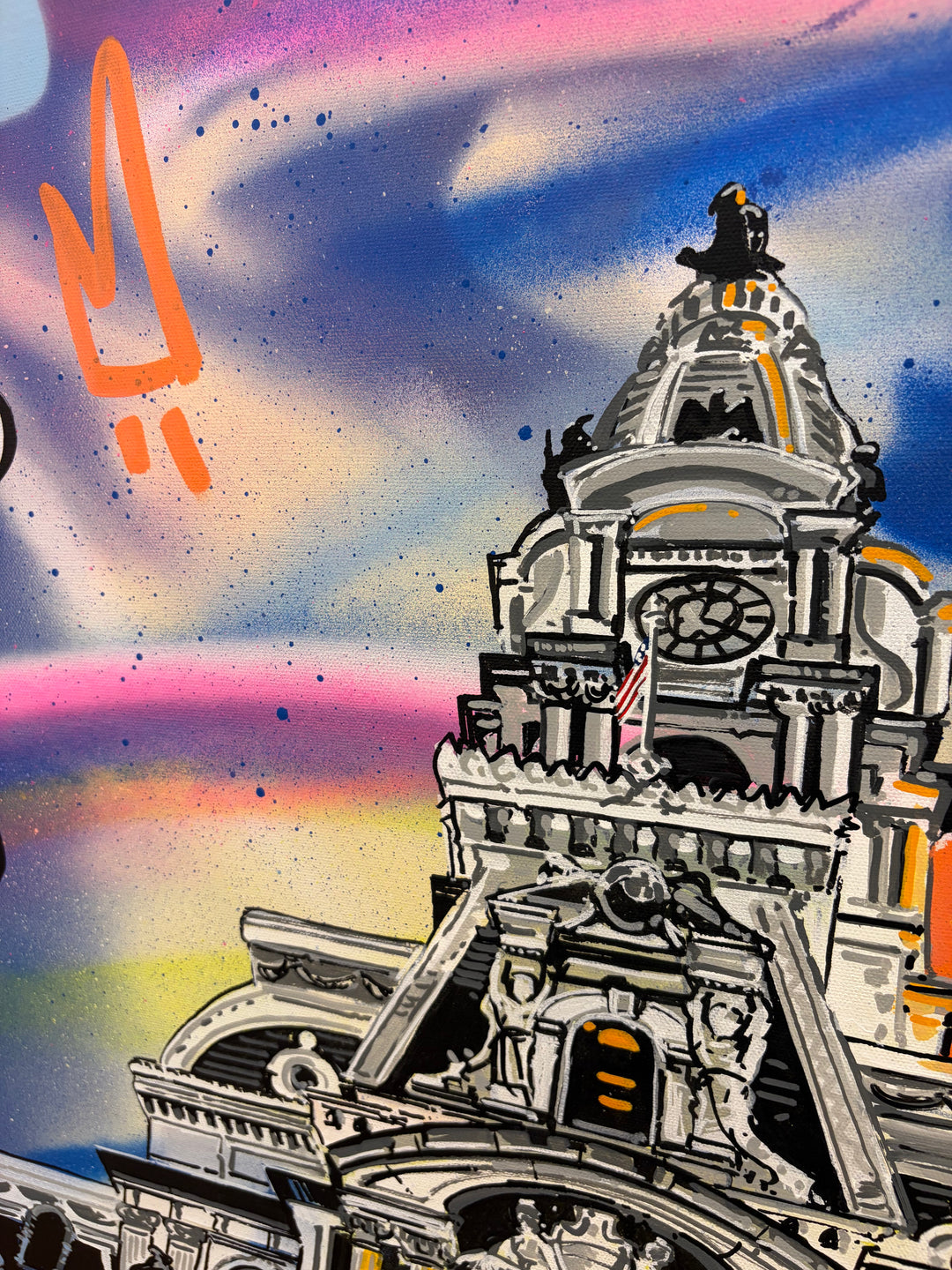 Close-up detail of "Greatest City" acrylic graffiti painting by Pappay showing the clock tower of Philadelphia City Hall against a colorful spray-painted sky