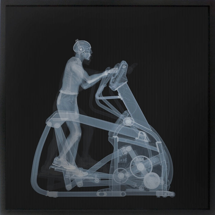 skeleton x ray figure working out elliptical machine retro exercise lenticular image  blue grey on black background