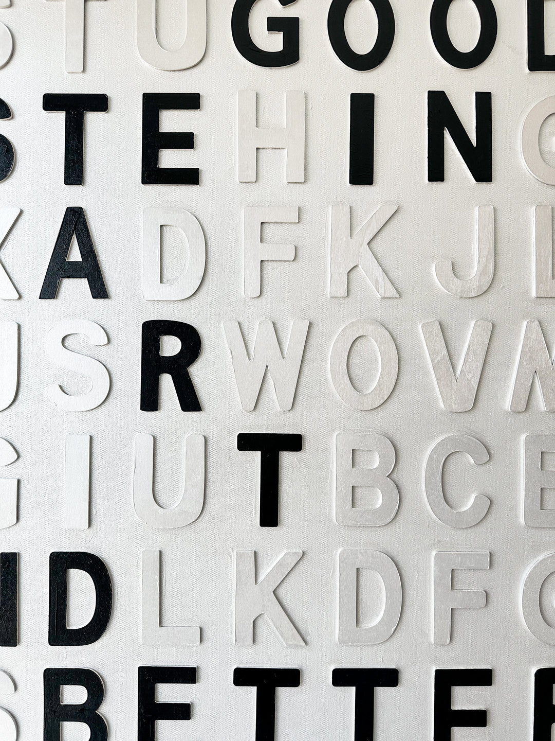 Steffanie Gerkin Have Good Taste White 3D, a contemporary mixed-media text artwork made with wood and acrylic on canvas, featuring raised black and white letters in a bold typographic composition.