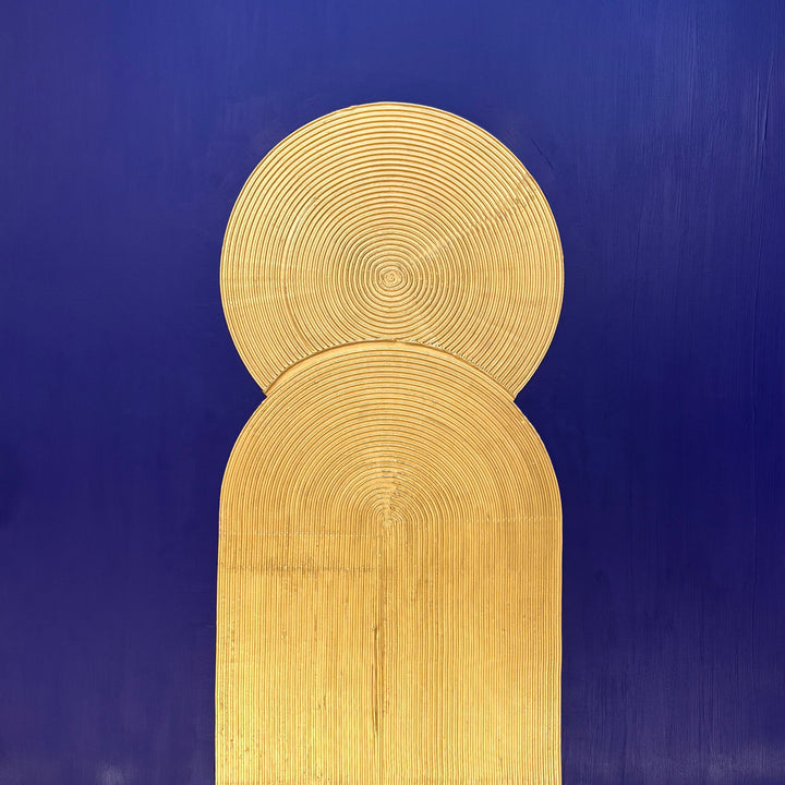 Lee in Cerulean, Halo Vaste I, joint compound and acrylic paint on canvas, 48 x 48 inches. Square textured painting with a deep blue background and a gold circle of concentric raised ridges overlapping the top of a gold arch that rises from the bottom edge.