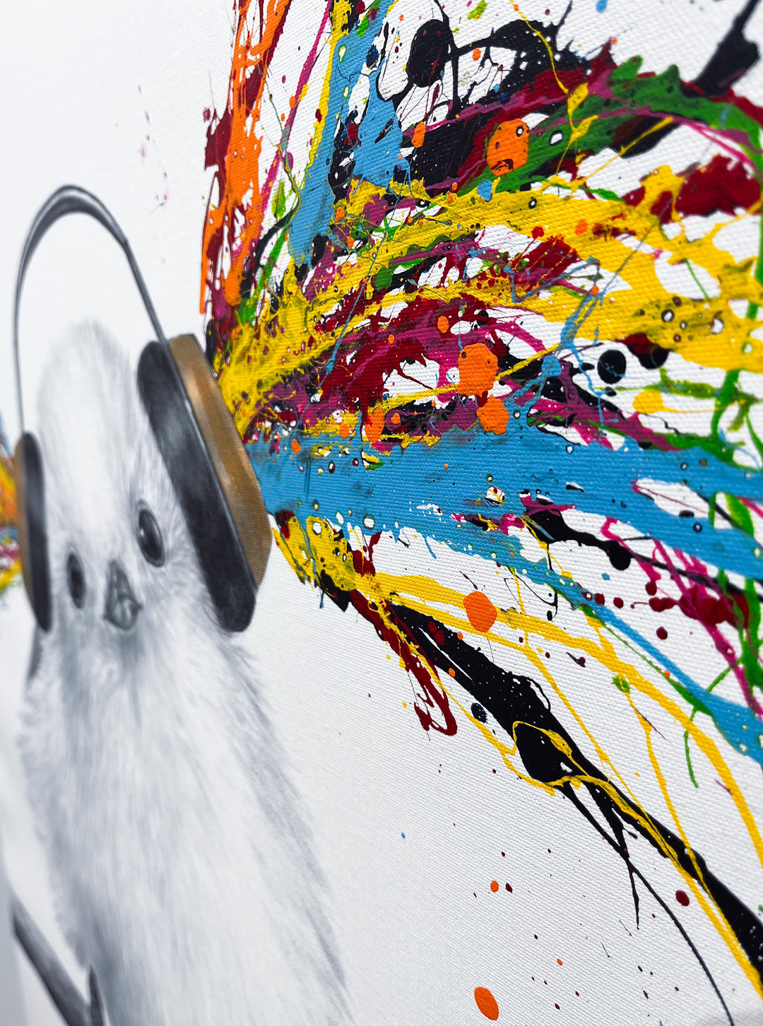 Happy Fluffy Funky Beats by Ashvin Harrison, fluffy baby bird with headphones, colorful splattered paint and coconut charcoal