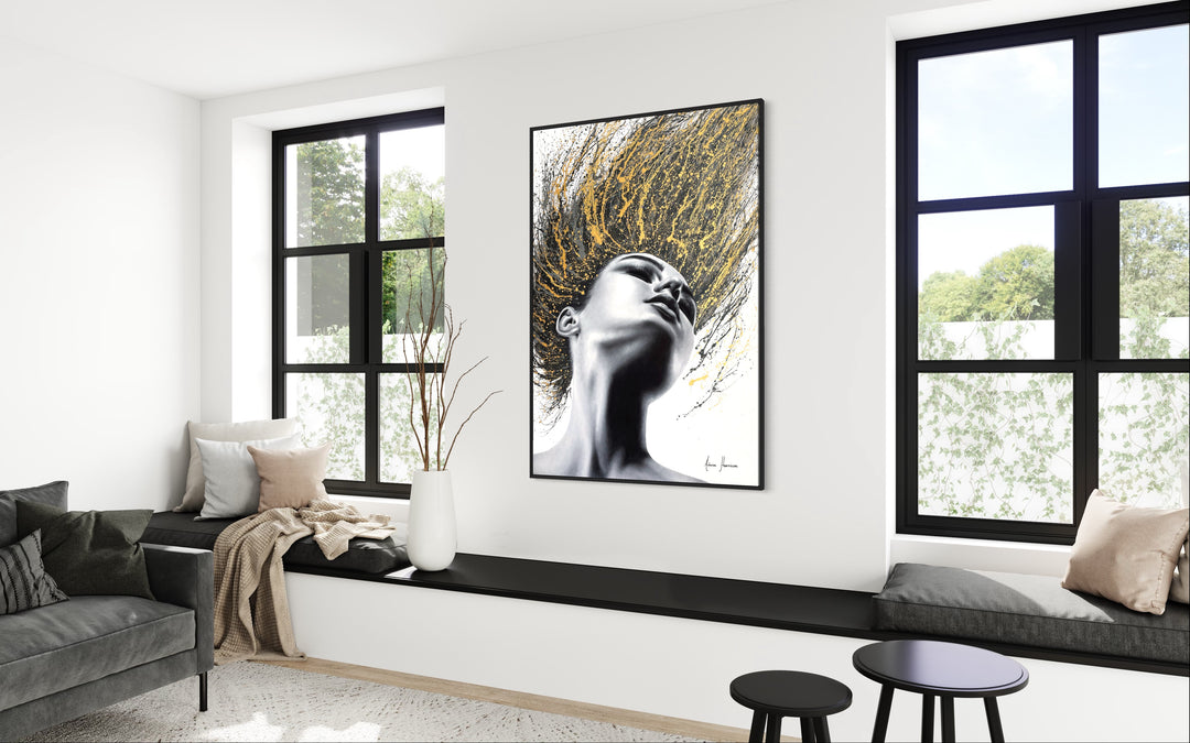 Woman flipping her hair, as golden and black paint splattered, high contrast painting