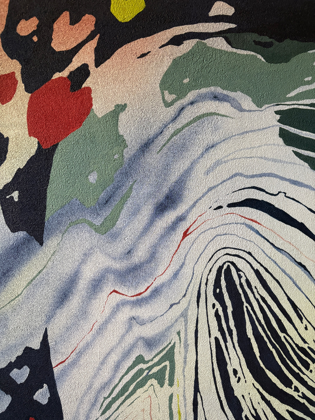 pumice primed canvas textured with rough rock surface in oil paint creating abstract paintings inspired by natural patterns in nature organic shapes gradient background opaque color blocking line work weight  green blue tones create fingerprint pattern identity with pops of red throughout  by local artist Erin Touey