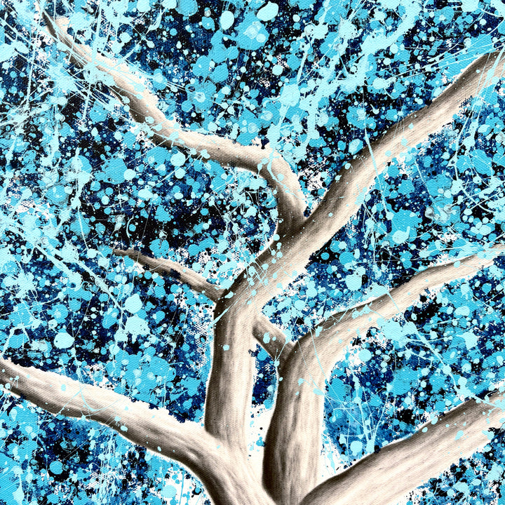 tree trunk and branches in black and white realistic with paint splattered blue expressionist abstract leaves acrylic in light blue and dark on white background