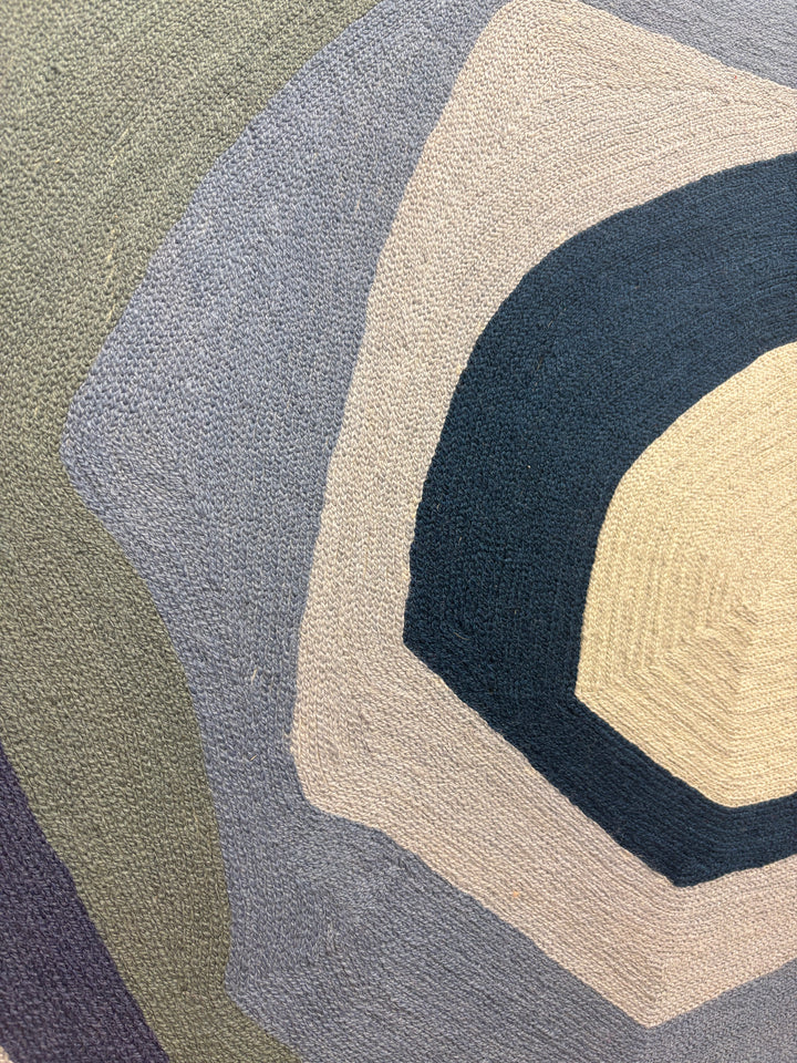 43"x42.5" chain-stitched textile with blue hues in a geometric form. 