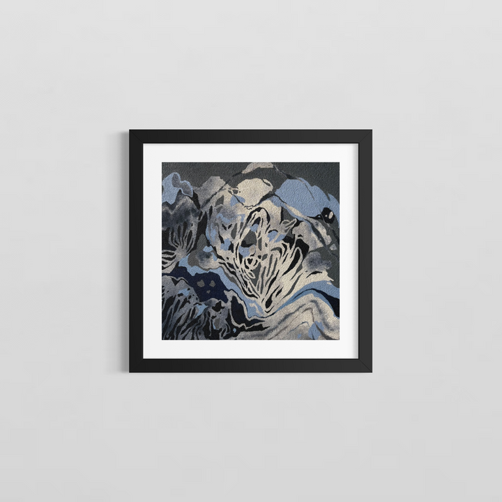 In The Weeds by Erin Touey framed in a black frame with white window matting, showing the blue, gray, and black abstract oil painting