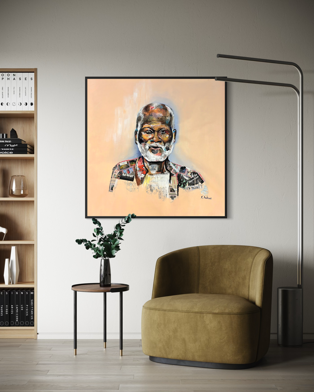 Keith Andrews, Keys of Free, acrylic and collage on parachute cloth, 42 x 42 inches, shown in a black frame above an olive green velvet armchair, beside a small side table with a plant, a wooden bookshelf and a black arc floor lamp.