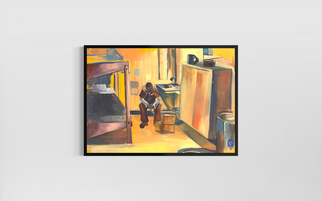 man sitting alone in empty prison cell with bed dresser in orange and brown tones