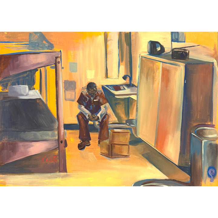 man sitting alone in empty prison cell with bed dresser in orange and brown tones