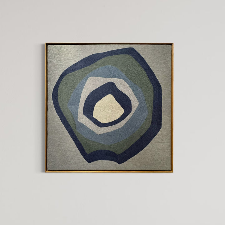 43"x42.5" chain-stitched textile with blue hues in a geometric form. 