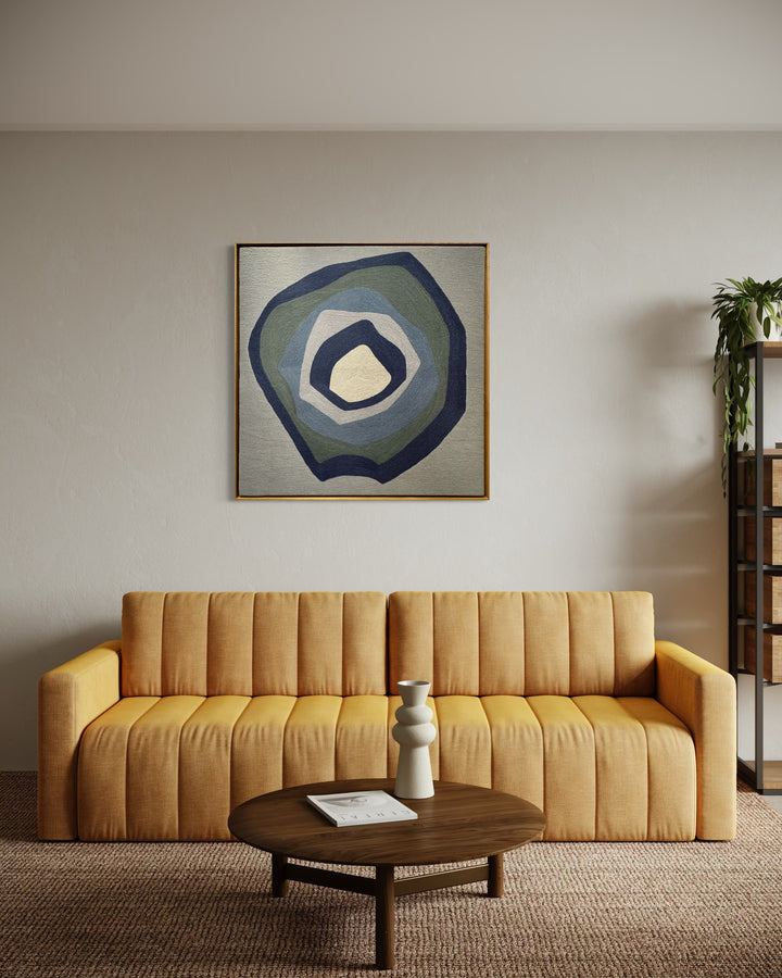43"x42.5" chain-stitched textile with blue hues in a geometric form. 