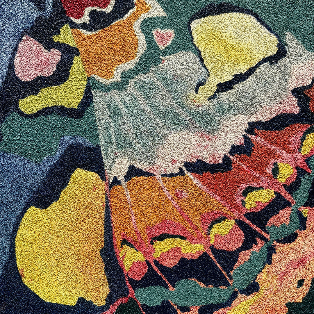 close up view abstracted butterfly insect wing on textured surface multicolor in oil on pumice