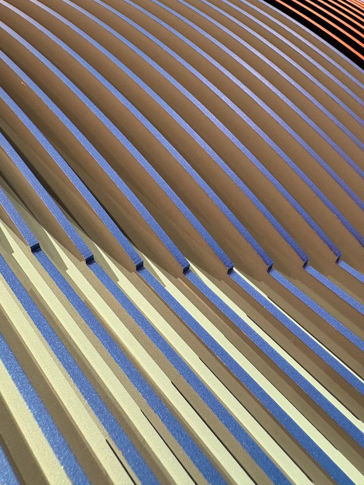 Porthole 361 by José Margulis – curved detail of the gold and blue plexiglass strip layers