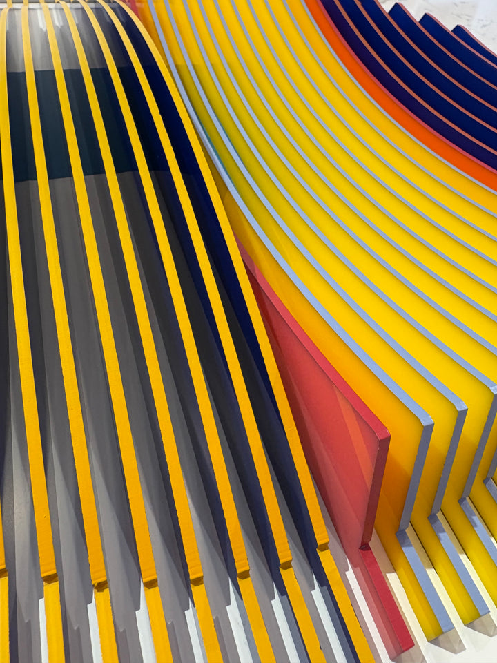 Porthole 440 by José Margulis – side detail of the layered yellow, navy, and red plexiglass strips showing the sculpture&