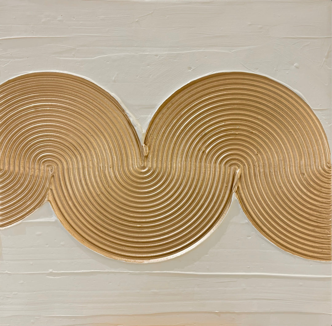 golden lines swirl across thick paint in neutral beige color texture 