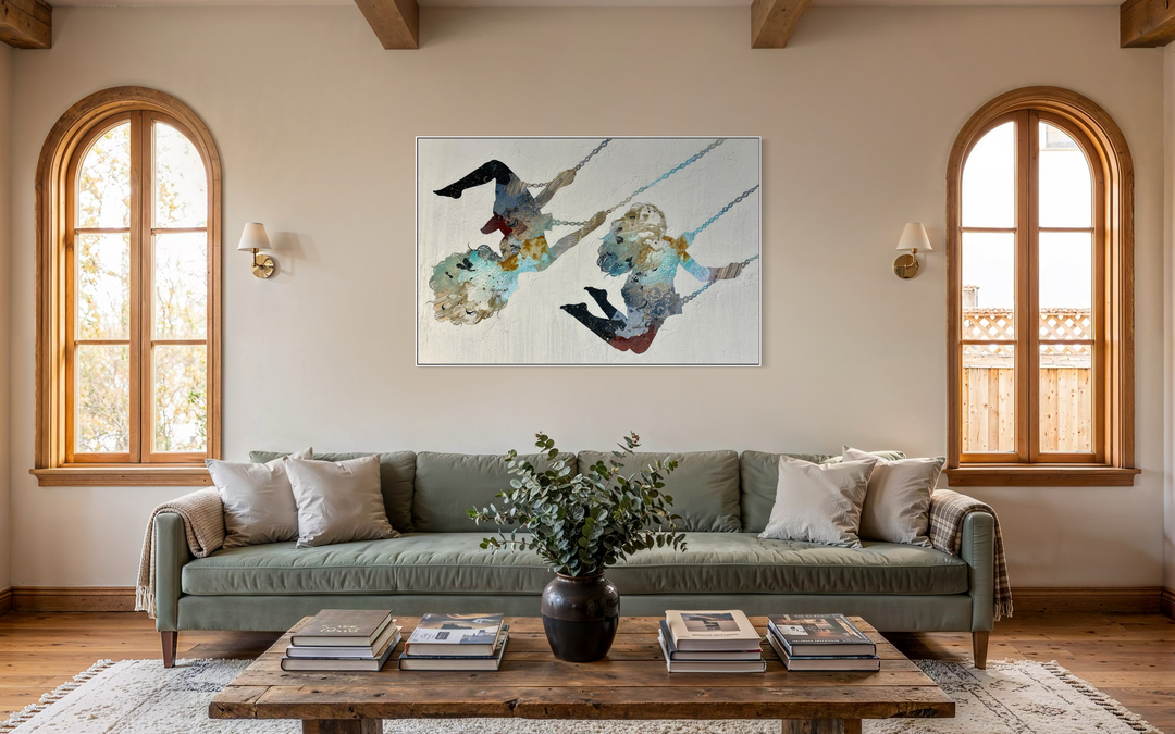 "Swinging Silhouettes" by Christopher Peter — a mixed-media collage painting on canvas depicting two women swinging on chains, their figures filled with layered botanical textures, celestial-patterned legwear, teal washes, gold accents, and floral patterns against a soft plaster-textured ivory background. A joyful, dreamlike celebration of freedom and feminine energy. Original contemporary mixed-media figurative collage painting on canvas available at Morton Contemporary gallery.