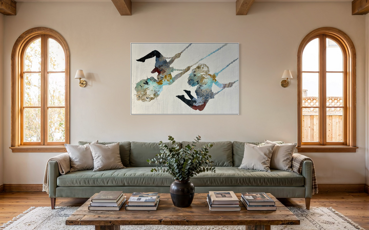"Swinging Silhouettes" by Christopher Peter — a mixed-media collage painting on canvas depicting two women swinging on chains, their figures filled with layered botanical textures, celestial-patterned legwear, teal washes, gold accents, and floral patterns against a soft plaster-textured ivory background. A joyful, dreamlike celebration of freedom and feminine energy. Original contemporary mixed-media figurative collage painting on canvas available at Morton Contemporary gallery.