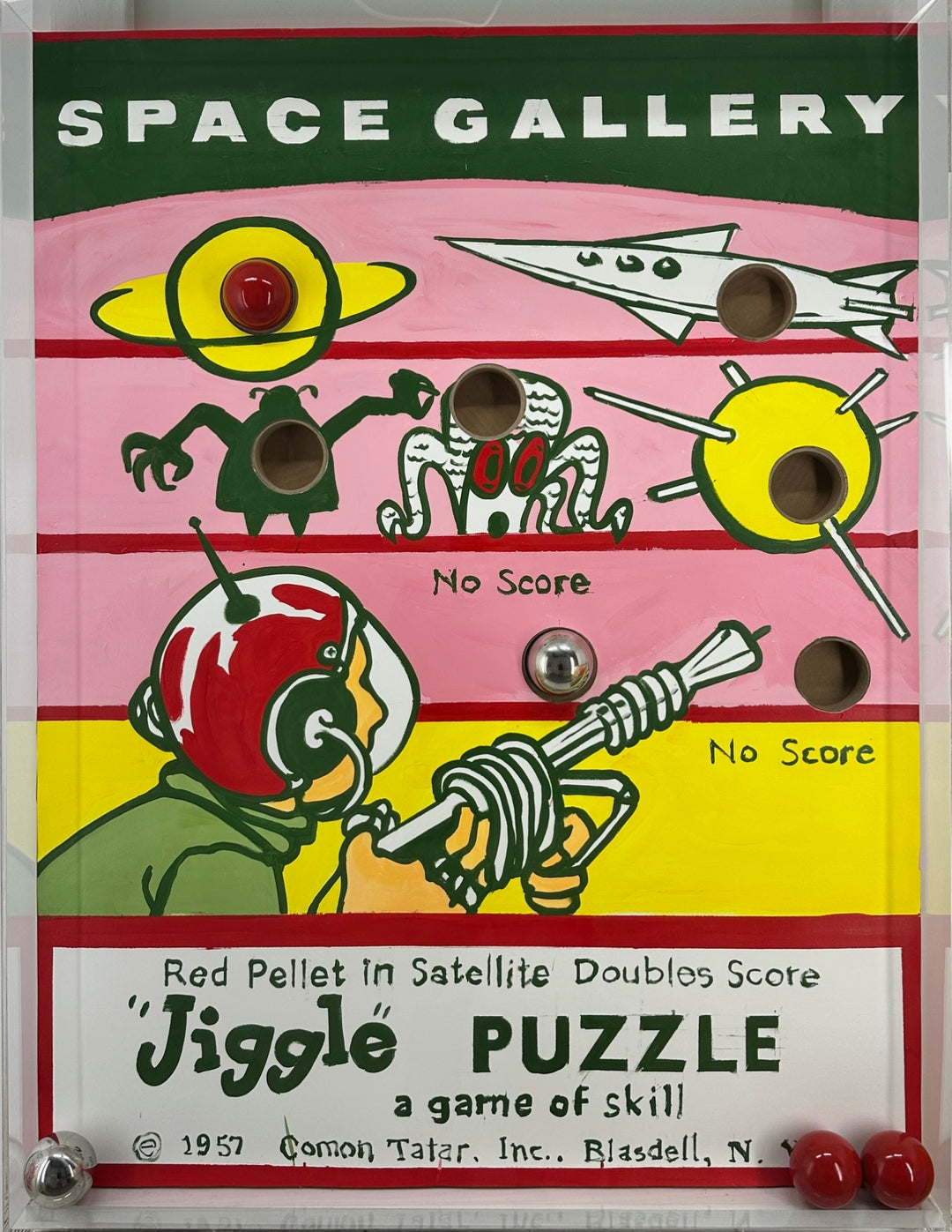 Vintage retro game child kid nostalgia graphic jiggle puzzle painting with acrylic in pink yellow and green balls inside glass box with holes 