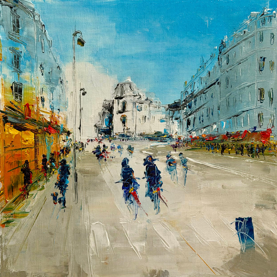 Christian Raffin, Sur Les Grands Boulevards, oil on canvas, 14 x 14 inches. A wide boulevard with tall pale buildings on the right, a street lamp and orange shopfronts on the left, a domed building in the distance, and cyclists in blue under a blue sky.