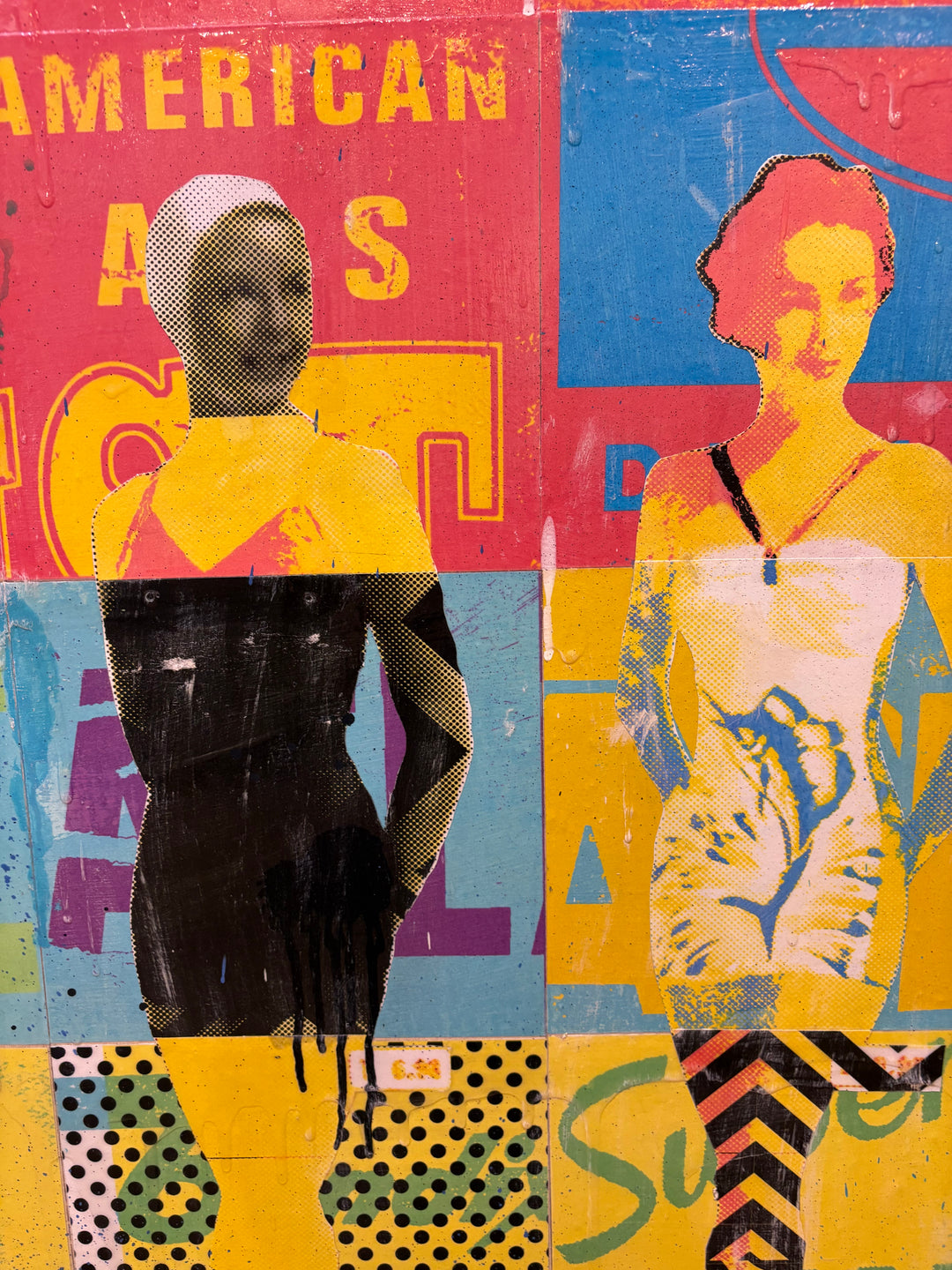 Swimsuits and Heels by Jon Davenport — angled detail of Neo-Pop mixed media painting showing two silhouetted figures over "American" collage typography in red, blue and yellow