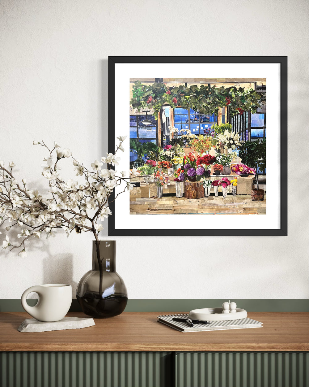 magazine cut paper collage art floral bouquets leaves in pinks purples and greens inside flower shop window