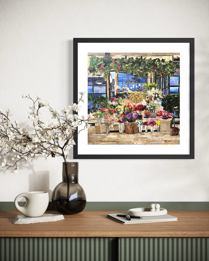 magazine cut paper collage art floral bouquets leaves in pinks purples and greens inside flower shop window