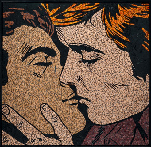 close up of two men kissing and holding another&