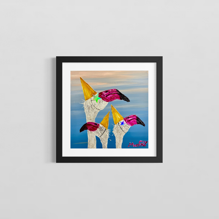 Unlimited by Moogly — framed semi-abstract humanimal painting in a black frame, showing flamingo-like creatures with golden hats, displayed against a white wall