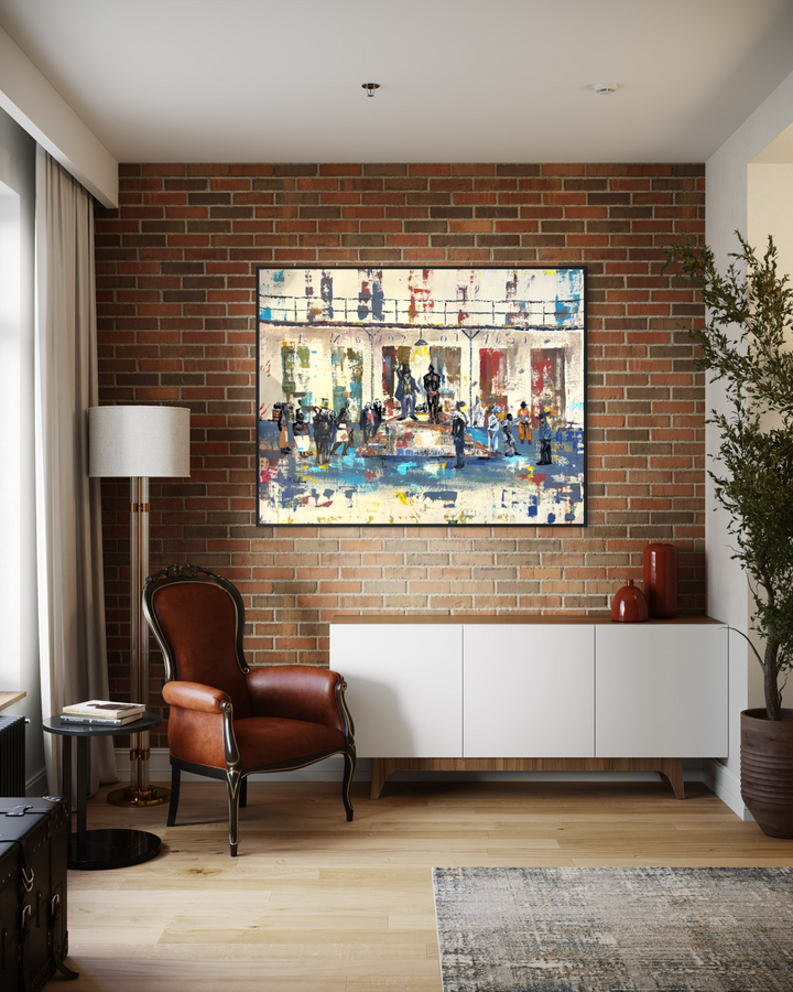Keith Andrews, Untitled Jail Scene, acrylic and collage on parachute cloth, 48 x 60 inches, shown framed on an exposed brick wall above a white sideboard, beside a brown leather armchair, a floor lamp and a potted olive tree.