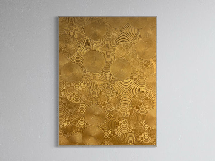 Visionary by Lee in Cerulean. Textured painting of gold circles, overlapping with smaller circles within creating a spiraled and whimsical effect.