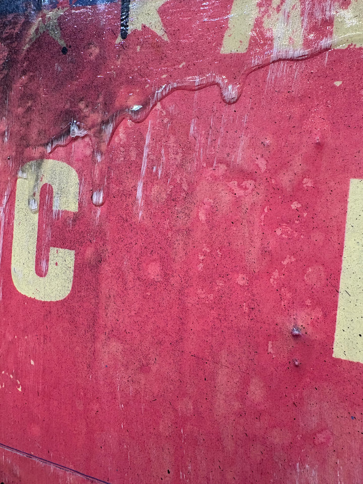 XOXO by Jon Davenport — angled detail of Neo-Pop mixed media painting showing textured red paint, drips and weathered lettering