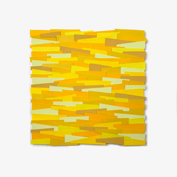 yellow shades in light and dark cut paper collage strips in square shape