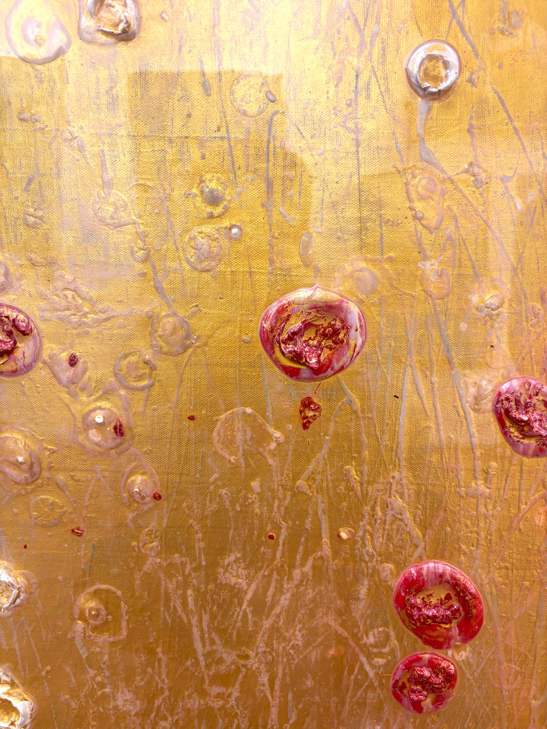 Golden shiny resin oil and acrylic panting textured 3 dimensional artwork with red and white organic spots by eric heitmann