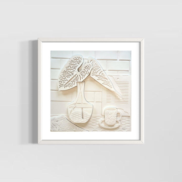 14"x14" layered white paper forming a a vase with leaves on a wall. 