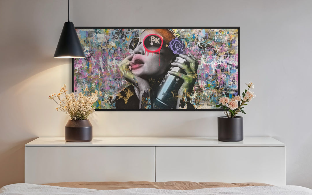 72"W x 36"H Acrylic paint, spray paint, wheat-paste, vintage advertisements, printed fragments on canvas. Posed woman with colorful graphics and DAIN&