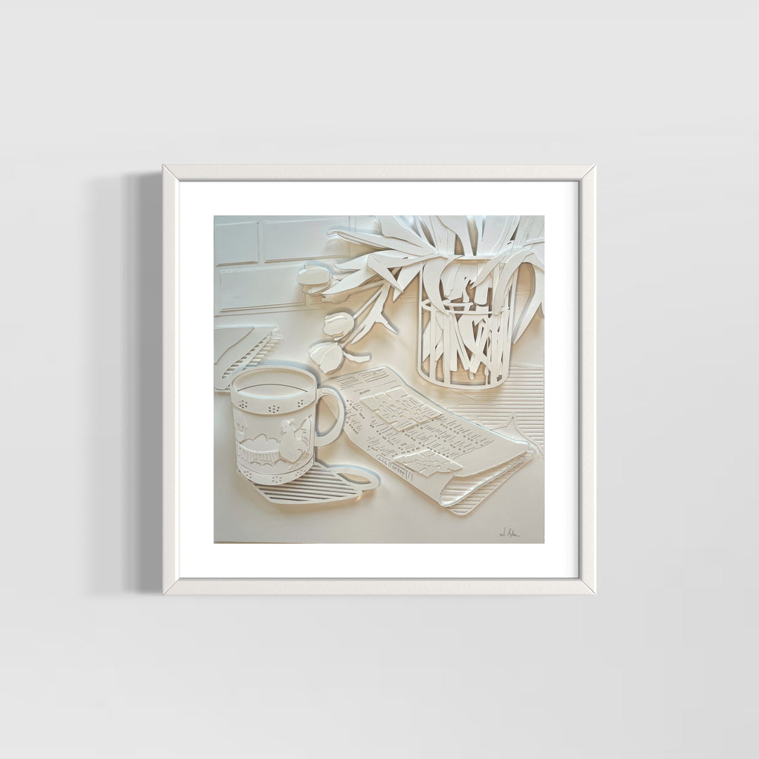 14"x14" paper cut collage featuring a coffee mug and crossword puzzle. 