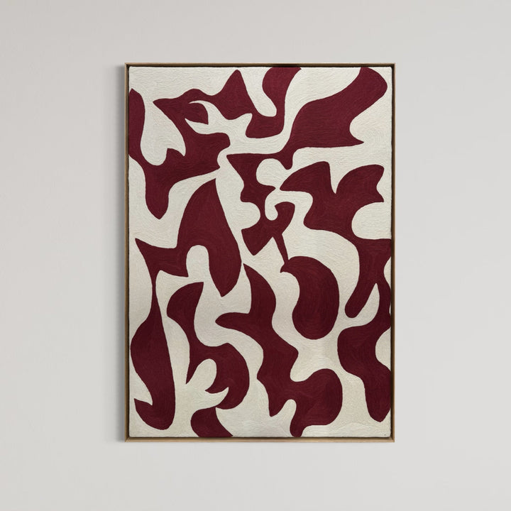 abstract shapes in rust orange red color on cream white background embroidery textile chain stitched design negative space shapes and patterns 
