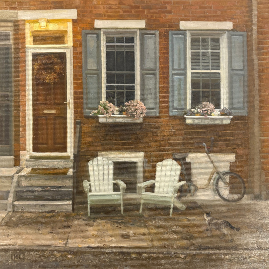 Oil painting of two white adirondack chairs in from a brick house with flower beds, cat and bike 